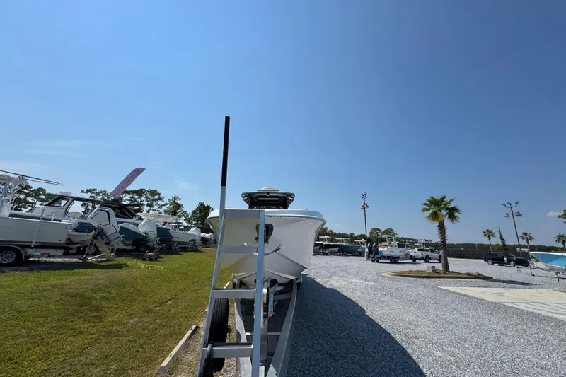 Slide: The Image of 2022 Nor-Tech 392 Super Fish boat on trailer in sunny outdoor lot. - 18