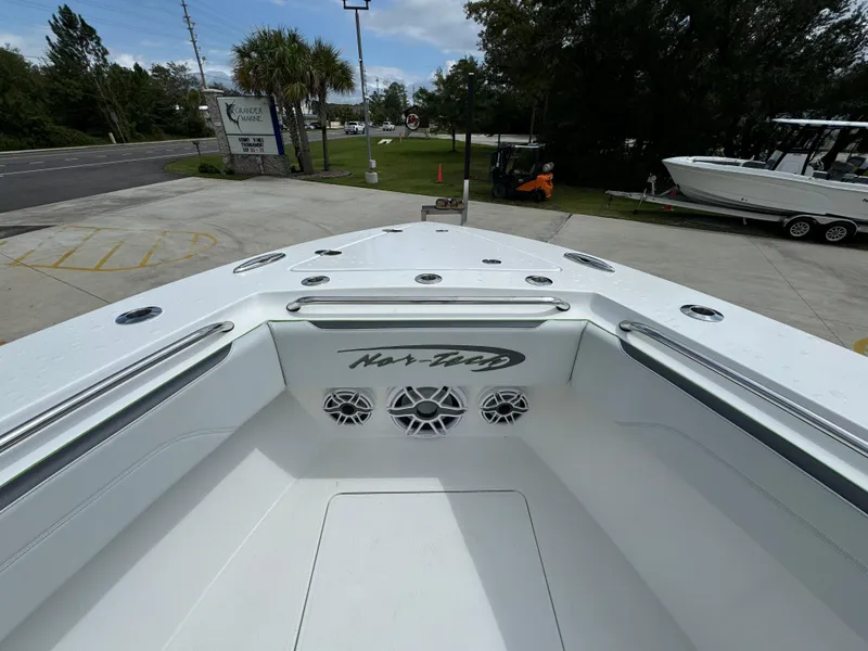 Slide: The Image of 2022 Nor-Tech 392 Super Fish boat, white deck, docked outdoors. - 19