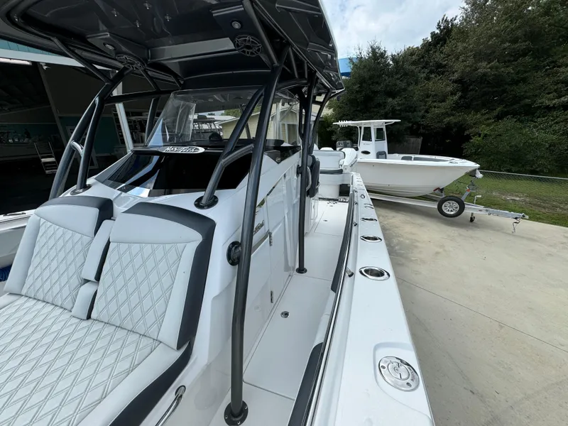 Slide: The Image of 2022 Nor-Tech 392 Super Fish boat with sleek design and spacious seating. - 25