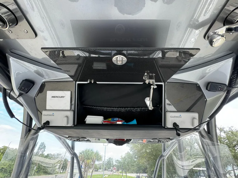 Slide: The Image of 2022 Nor-Tech 392 Super Fish dashboard with Garmin and Mercury electronics. - 35