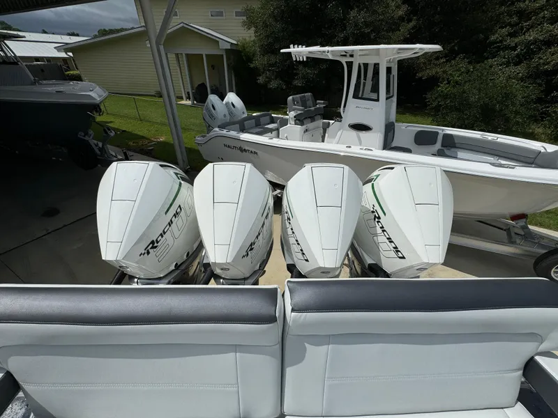Slide: The Image of 2022 Nor-Tech 392 Super Fish with quad outboard engines in a driveway. - 42