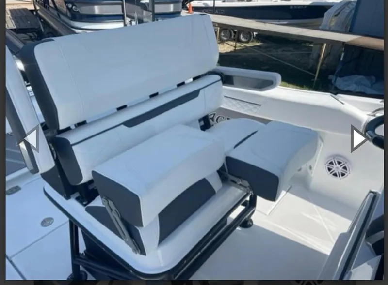 Slide: The Image of 2023 Blackfin 252 CC boat seating with modern design and comfortable upholstery. - 14