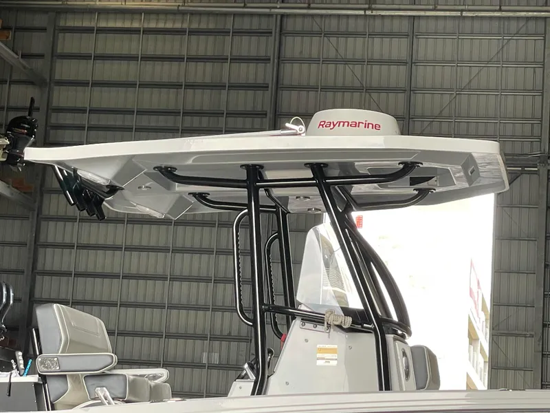 Slide: The Image of 2023 Blackfin 252 CC boat with Raymarine equipment in a storage facility. - 18