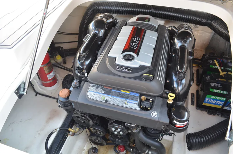 Slide: The Image of Engine compartment of 2020 Chaparral 257 SSX boat with visible 6.2L engine. - 18