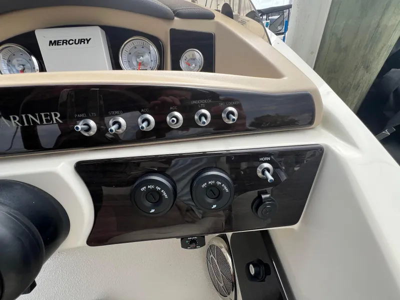 Slide: The Image of 2015 Harris FloteBote Grand Mariner SL 250 dashboard with Mercury controls and switches. - 12