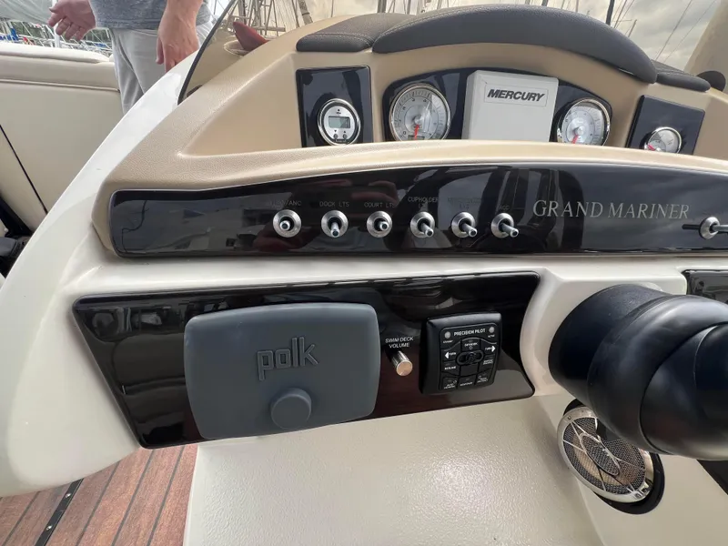 Slide: The Image of Dashboard of 2015 Harris FloteBote Grand Mariner SL 250 with Mercury gauges and Polk audio system. - 13
