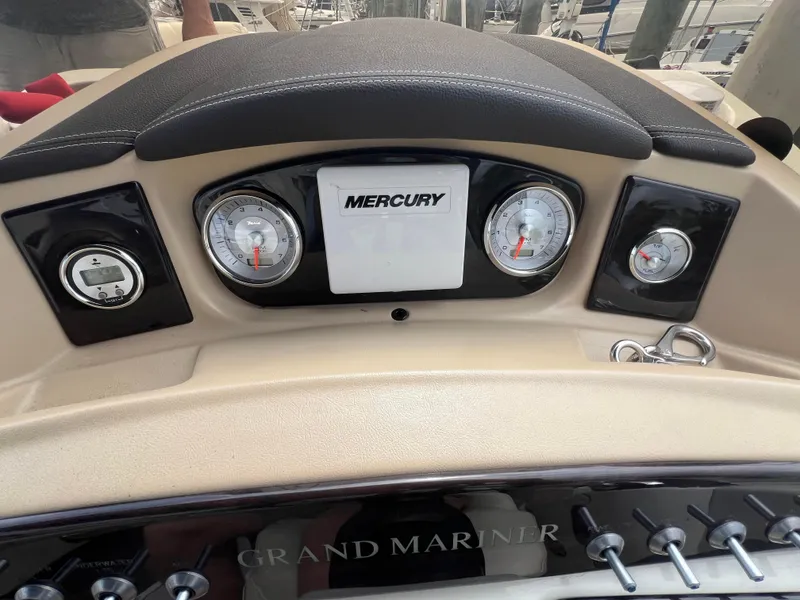 Slide: The Image of Dashboard of 2015 Harris FloteBote Grand Mariner SL 250 with Mercury gauges. - 14