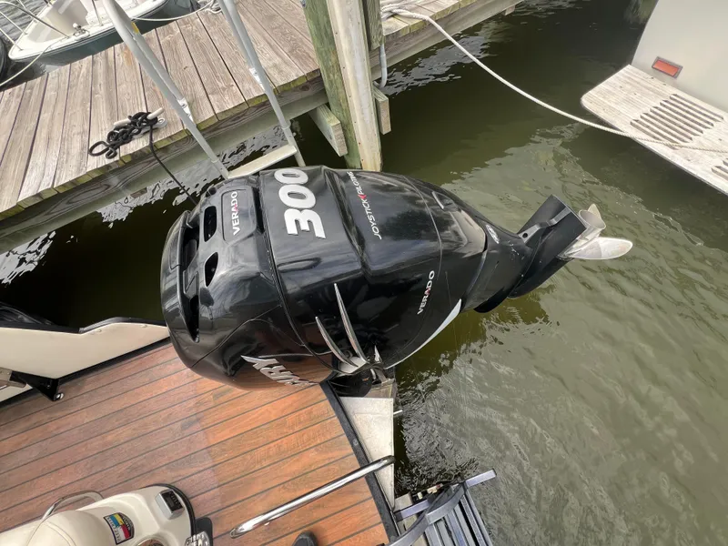 Slide: The Image of 2015 Harris FloteBote Grand Mariner SL 250 with Mercury Verado 300 outboard motor. - 2