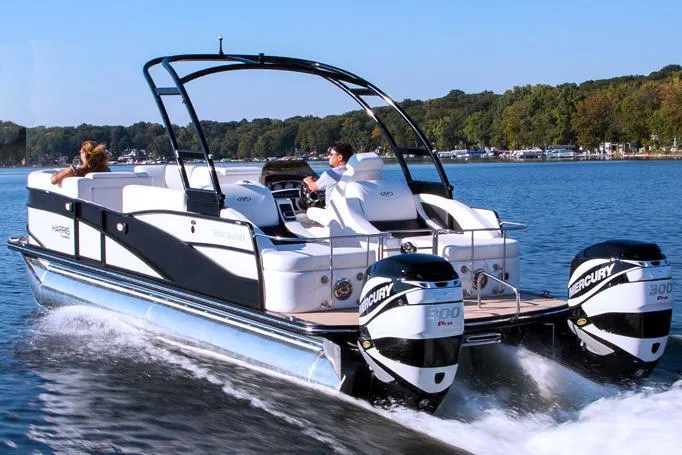 Slide: The Image of 2015 Harris FloteBote Grand Mariner SL 250 cruising on a lake with twin Mercury engines. - 39