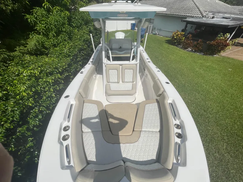 Slide: The Image of 2021 Sea Fox 248 Commander boat with spacious seating and modern design. - 2