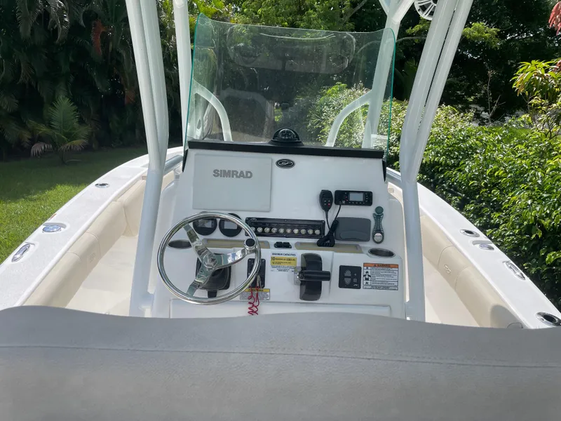 Slide: The Image of 2021 Sea Fox 248 Commander boat console with steering wheel and controls. - 8