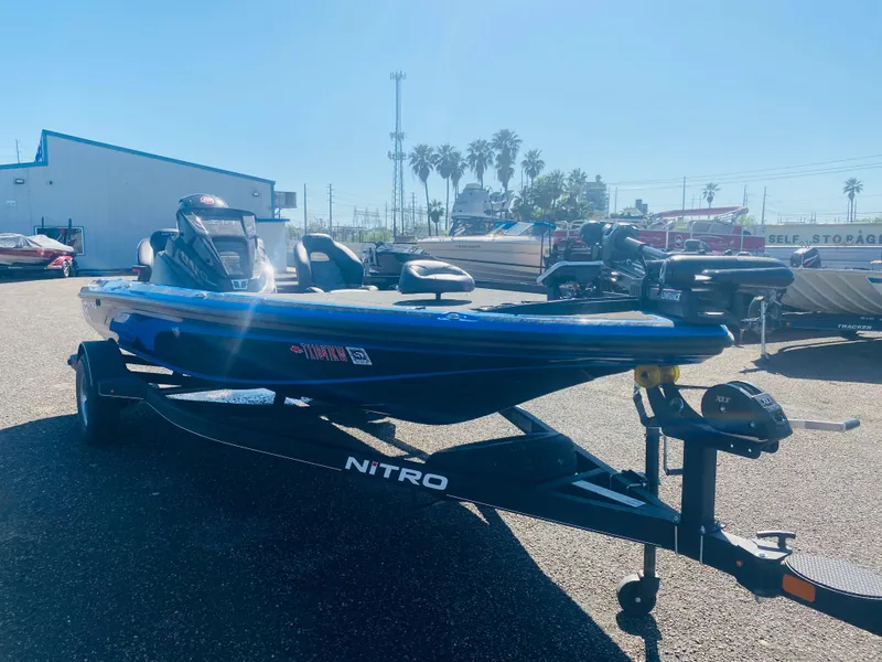 The Image of 2023 Nitro Z18 boat on trailer in sunny outdoor setting. - 0