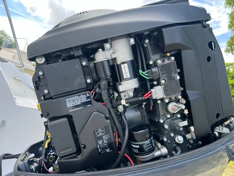 Slide: The Image of Close-up of a 2011 Hurricane SUNDECK SPORT 220 boat engine components. - 34