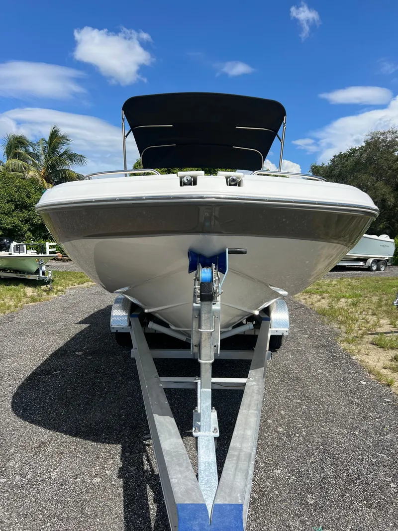 Slide: The Image of 2011 Hurricane SUNDECK SPORT 220 boat on trailer, sunny day, blue sky. - 5