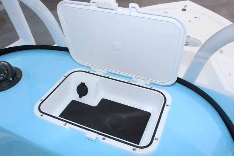 Slide: The Image of Open storage compartment on 2025 Sea Pro 250 Bay boat. - 23