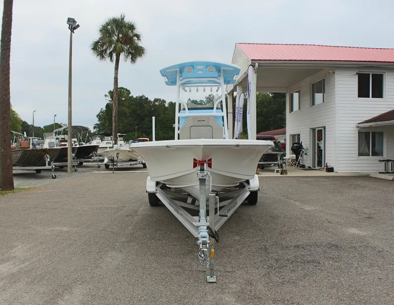 Slide: The Image of 2025 Sea Pro 250 Bay boat on trailer at dealership. - 3