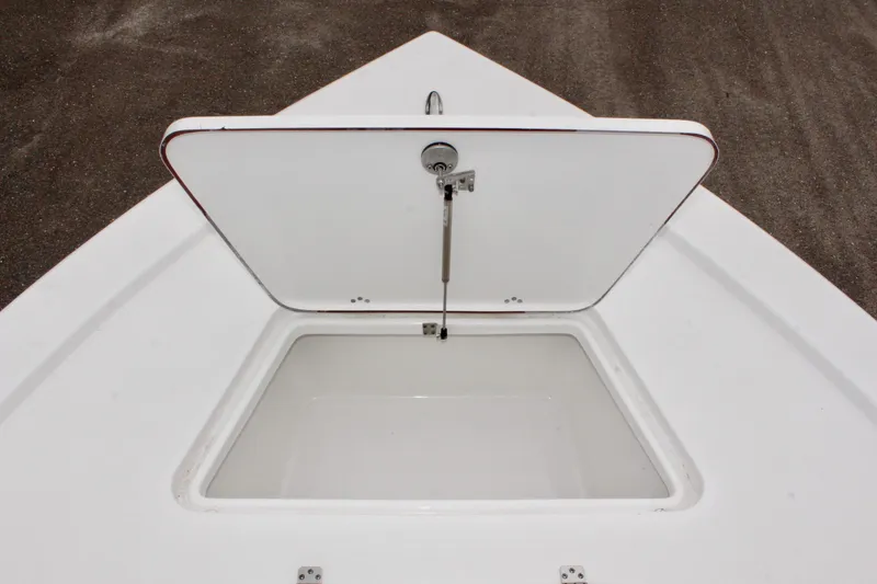 Slide: The Image of Open storage compartment on 2025 Sea Pro 250 Bay boat. - 34