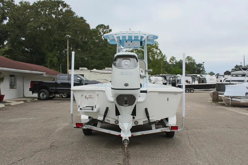 Slide: The Image of 2025 Sea Pro 250 Bay boat on trailer, rear view in parking lot. - 7