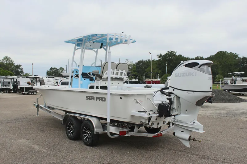 Slide: The Image of 2025 Sea Pro 250 Bay boat on trailer with Suzuki outboard motor. - 8