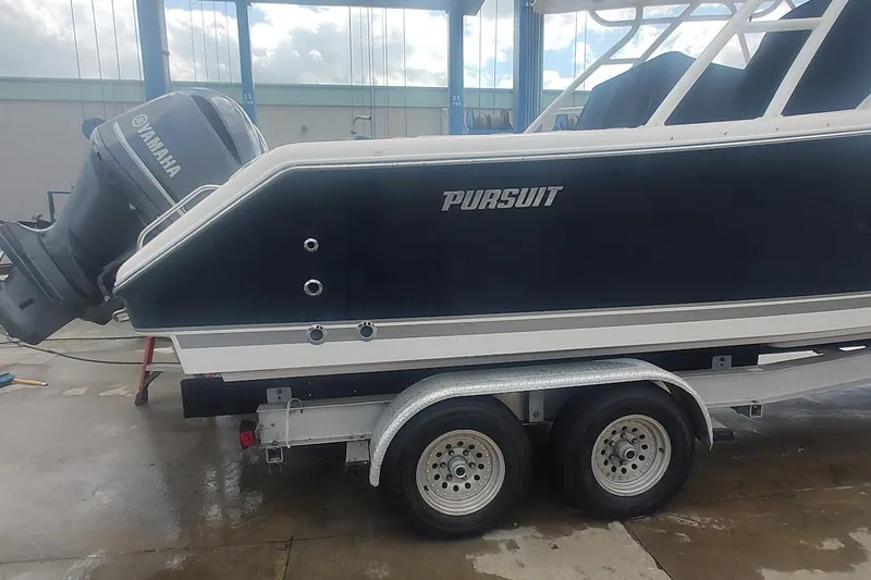 Slide: The Image of 2015 Pursuit S 280 Sport boat on trailer with Yamaha engine. - 27