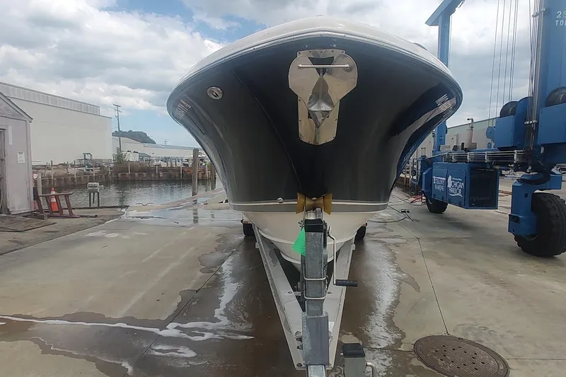 Slide: The Image of 2015 Pursuit S 280 Sport boat on trailer at marina dockside. - 28