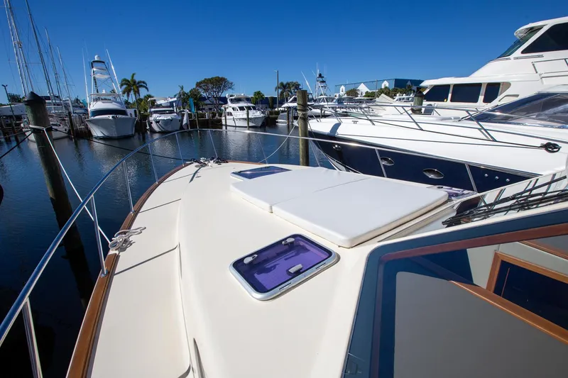 Slide: The Image of Luxury yacht docked in marina, 2017 Palm Beach 42, sunny day, serene waters. - 29