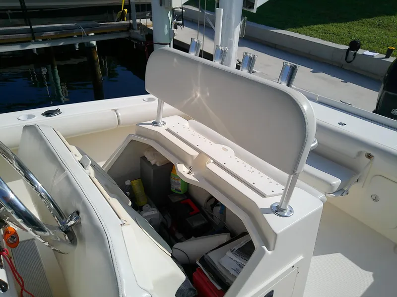 Slide: The Image of 2004 Trophy 2503 Center Console boat interior with storage and seating. - 22