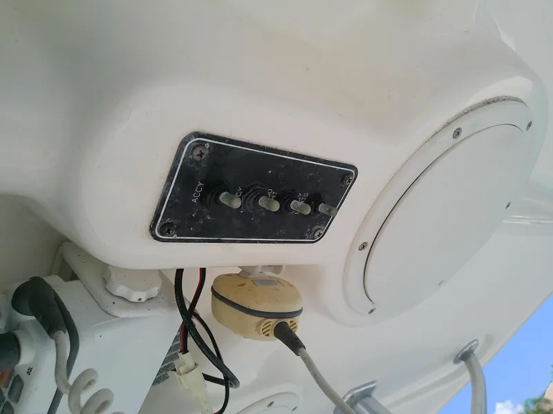 Slide: The Image of Close-up of control panel on 2004 Trophy 2503 Center Console boat. - 36