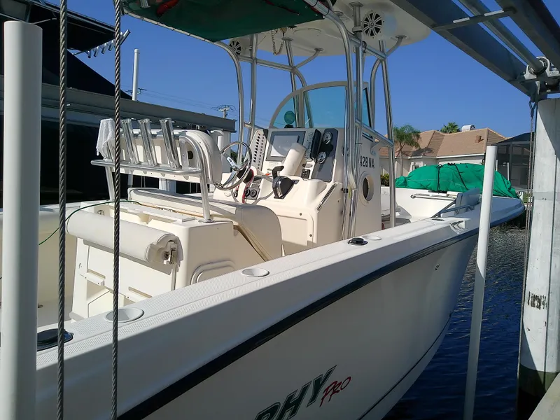 Slide: The Image of 2004 Trophy 2503 Center Console boat docked in marina. - 6