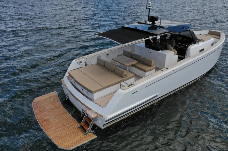 Slide: The Image of 2024 Pardo Yachts P43 luxury yacht on water, featuring spacious deck and modern design. - 14
