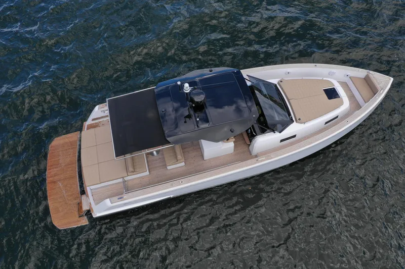 Slide: The Image of 2024 Pardo Yachts P43 luxury yacht on open water, aerial view. - 15