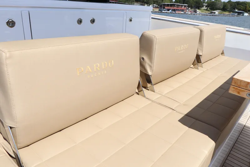 Slide: The Image of Beige seating on 2024 Pardo Yachts P43, dockside view. - 31