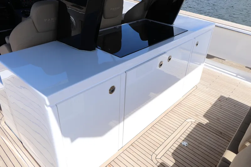 Slide: The Image of 2024 Pardo Yachts P43 deck with sleek white cabinetry and modern design. - 34