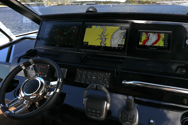 Slide: The Image of 2024 Pardo Yachts P43 helm with advanced navigation displays and controls. - 22