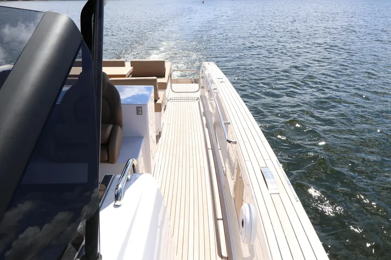 Slide: The Image of 2024 Pardo Yachts P43 luxury yacht deck on open water. - 25