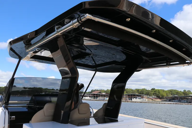 Slide: The Image of 2024 Pardo Yachts P43 with sleek black canopy on a sunny day. - 33