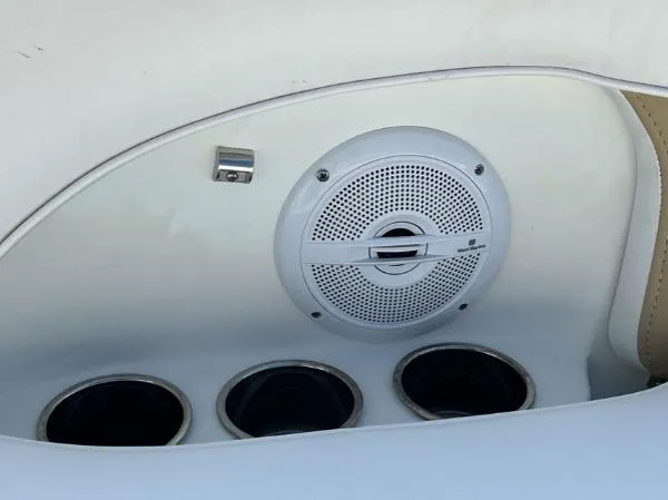 Slide: The Image of 2014 SouthWind 2200 SD boat interior with speaker and cup holders. - 14