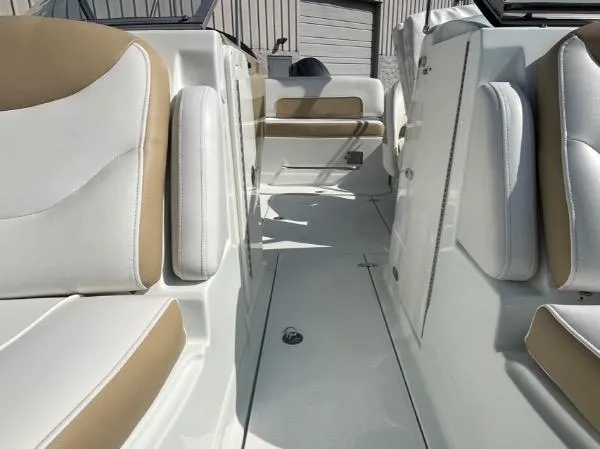 Slide: The Image of 2014 SouthWind 2200 SD boat interior with beige and white seating. - 15