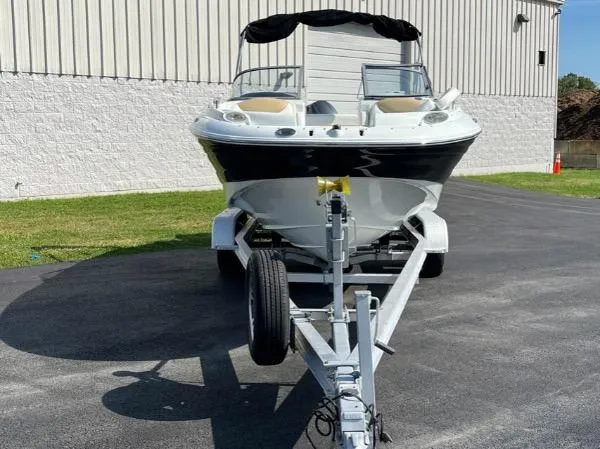 Slide: The Image of 2014 SouthWind 2200 SD boat on trailer, parked outdoors. - 3