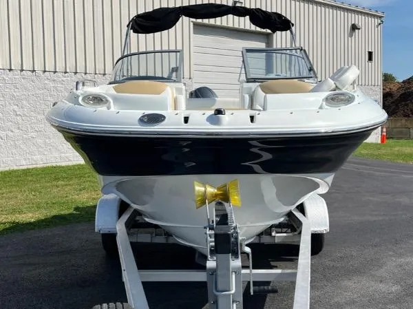 Slide: The Image of 2014 SouthWind 2200 SD boat on trailer, parked outdoors. - 4