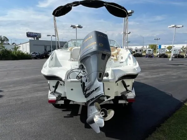 Slide: The Image of 2014 SouthWind 2200 SD boat with Yamaha outboard motor, parked on asphalt. - 5