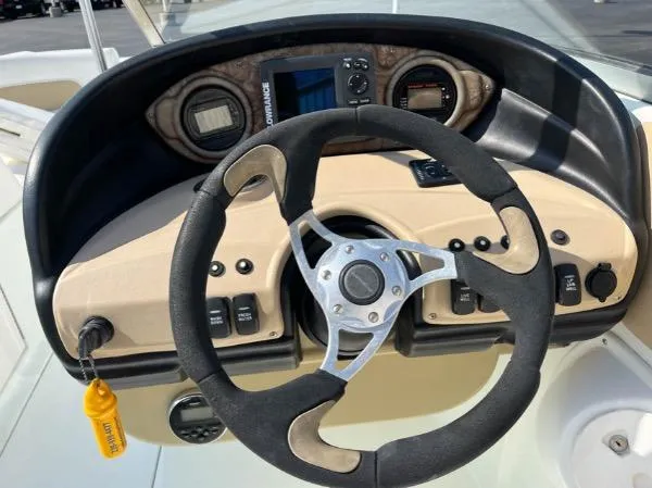 Slide: The Image of Steering wheel and dashboard of 2014 SouthWind 2200 SD boat. - 6