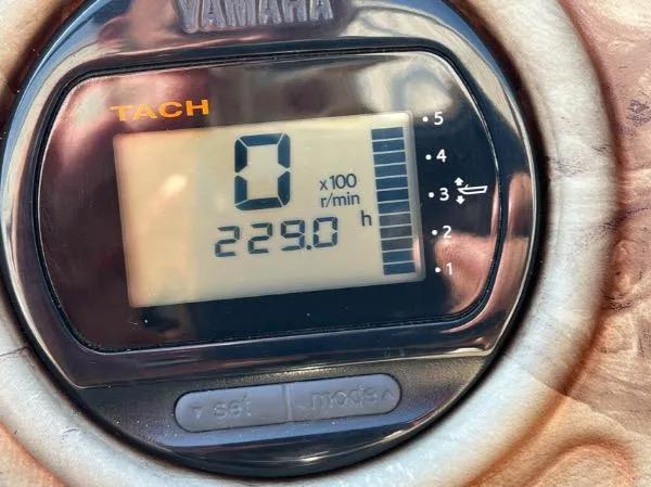 Slide: The Image of Yamaha tachometer displaying 229 hours on a 2014 SouthWind 2200 SD boat. - 7