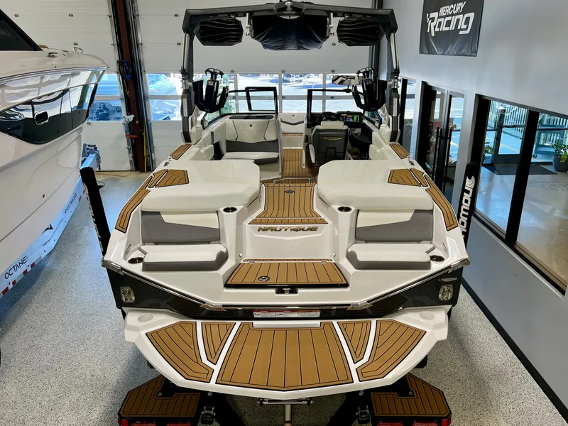 Slide: The Image of 2023 Nautique Super Air G23 boat with sleek design and spacious interior. - 29