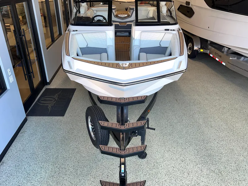 Slide: The Image of 2023 Nautique Super Air G23 boat on trailer in showroom. - 4