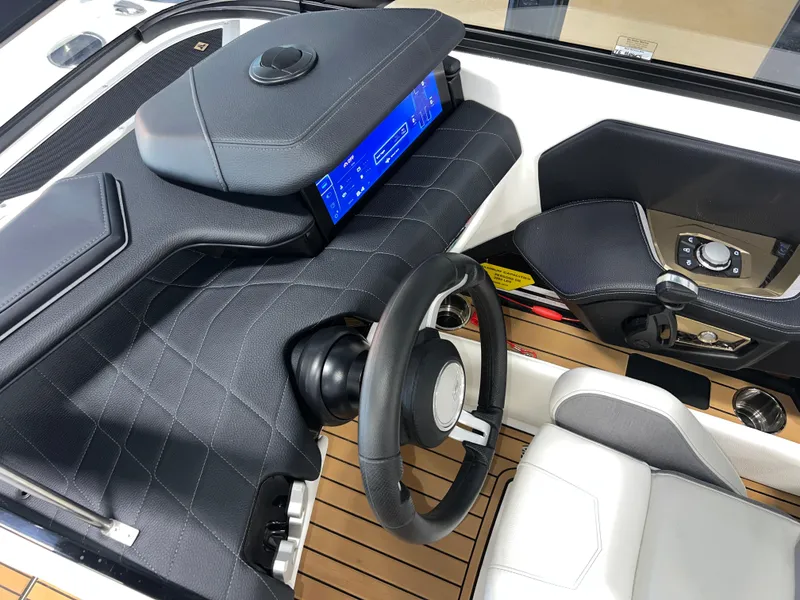Slide: The Image of 2023 Nautique Super Air G23 dashboard with modern controls and sleek design. - 41