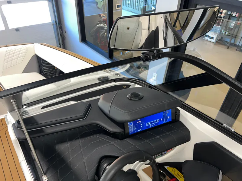 Slide: The Image of 2023 Nautique Super Air G23 dashboard with modern controls and sleek design. - 42