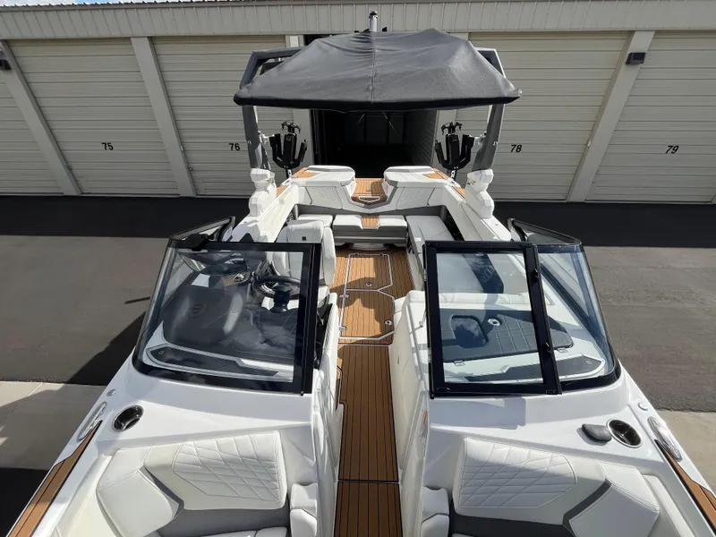 Slide: The Image of 2023 Nautique Super Air G23 boat with sleek design and spacious interior. - 70
