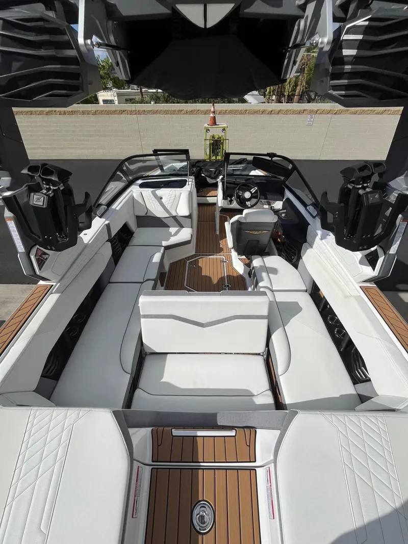 Slide: The Image of 2023 Nautique Super Air G23 boat interior with luxurious seating and sleek design. - 72