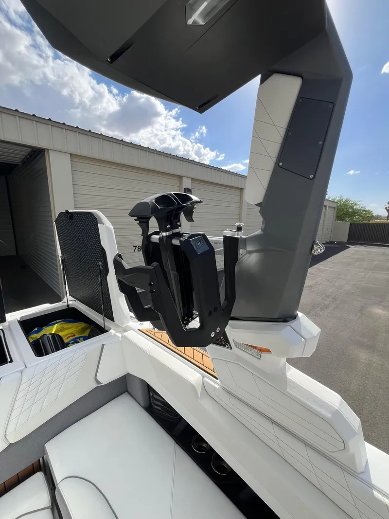Slide: The Image of 2023 Nautique Super Air G23 boat interior with advanced wakeboard tower. - 77